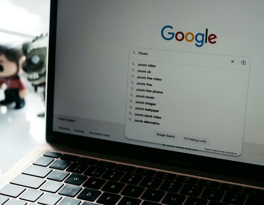 Photo of a Laptop Screen with Google Main Page on It